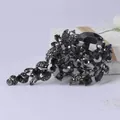 Eleganter Vintage-Blumenbrosche mit schwarzen Strasssteinen und dunklen Kristallen - Schwarz