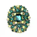 Elegant vintage emerald green crystal glass floral brooch with gold-toned metal base - Green