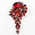 Elegante vintage broche met rode strassteentjes en bloemontwerp voor feestelijke kleding - Rood