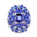 Elegant vintage oval brooch featuring royal blue crystals and shiny AB rhinestones - Blue