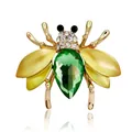 Elegante vintage goudkleurige bijenbroche met groot groen kristal en emaille vleugels - Bij Stijl 10