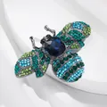 Vintage hommel broche met levendige groene en blauwe kristallen strassteentjes - Bij Stijl 22
