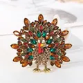 Een elegante vintage pauwenbroche met kleurrijke strass-steentjes op bronzen basis - Bronzen Meerkleurige Strass Stijl (15) / Universele Specificatie