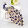 Elegante vintage pauwenbroche met levendige blauwe strass-steentjes en goudkleur - Gouden Basis Donkerblauwe Openingsstijl (19) / Universele Specificatie