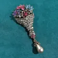 Vintage crystal bouquet brooch with a teardrop pearl on dark green background - Gold Rhinestone Bouquet Pearl Style (SMT1005005323853527)