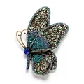 Macro view of an elegant vintage butterfly brooch with sparkling blue and green rhinestones - Side-flying Large Butterfly / Sky Blue