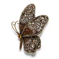 Macro detail of a vintage-style butterfly brooch featuring brown and AB rhinestones on filigree - Side-flying Large Butterfly / Champagne