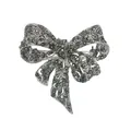 Detailansicht einer Vintage-Brosche in Schleifenform mit dunklen Strasssteinen. - Schleife Stil (f-017) / Silber
