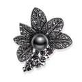 Detailansicht einer Vintage-Blumenbrosche mit großer schwarzer Perle und dunklen Strasssteinen. - Blumen und Blatt Cluster Stil (f-016) / Schwarz und Grau