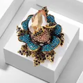 Macro view of luxury crystal flower brooch featuring blue and champagne gems - xz4979C Champagne / Champagne