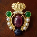 Detailed view of a vintage Baroque crown brooch with purple, green stones and pearls - Style E (5.5x4cm)