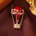 Vintage red enamel hot air balloon brooch with gold-tone chain and basket detail - Hot Air Balloon / Red