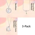 Set van drie elegante zilveren kettingen met hangers van parel, maansteen en bloem - 3-delige Set 4 (Ginkgo + Bloemen + Maanlicht) / Eenvoudige Verpakking / 3-pack / Zilver