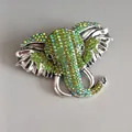 Vintage olifant broche met groene strass steentjes in zilverkleurige legering - Olifantenkop (Sm01) / Zilver