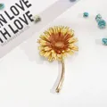 Elegant golden and orange enamel flower brooch in daisy design with slender stem - Orange Brown Daisy (AL669301365390)
