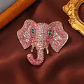 Vintage olifant broche met roze strassteentjes, goudkleurige afwerking en groene ogen. - Roze Strass Olifant (14) / Roze
