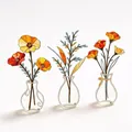 Handcrafted set of three artistic metal flower decorations in mini glass vases for shelf decor - Orange Poppy and Yellow Wildflower / Orange