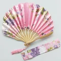 Detailed view of pink floral kimono fan set with matching fabric sleeve and tassel - Pink / Single Piece (With Bag)