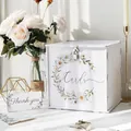 Elegant white acrylic wedding card box featuring daisy floral wreath and lock mechanism. - Daisy Pattern (250237B)