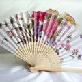 Elegant Japanese style folding fan with purple floral satin print and natural bamboo ribs - White