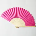 Macro detail of a vibrant rose red silk folding fan featuring hollow bamboo ribs. - Magenta (No. 2)