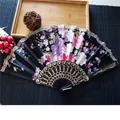 Elegant black satin folding fan featuring floral print and golden lace trim detail - No.1 Black