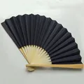 Detailed top view of 9 inch black double-sided blank folding fan with bamboo ribs - Black