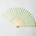 Detailed view of a blank beige paper fan with carved bamboo ribs for DIY crafts. - Light Green