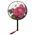 Detail view of a traditional Chinese round fan with pink peony and red tassel. - 11 National Beauty (FANS-ts01) / 20cm