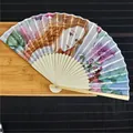 Detailed view of 21cm silk folding fan with classical European oil painting and bamboo ribs. - Girls / 21cm