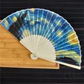 Elegant 21cm folding fan featuring Van Gogh's Starry Night print and bamboo ribs - The Starry Night / 21cm