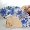 Elegant 21cm Japanese folding fan with blue floral pattern and carved bamboo frame - No. 8 Blue and White Porcelain