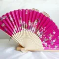 Fuchsia Japanese folding fan with floral patterns and natural bamboo ribs, 21cm size - No. 13 Rose Red