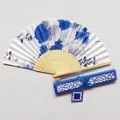 Close-up detail of Japanese style folding fan with blue floral print and hollow gift box - Blue And White Porcelain (IFANS) / Royal Blue Gift Box Set
