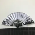 Traditional 23cm Chinese bamboo folding fan with ink bamboo painting and tassel - Black Rib White Face Bamboo Leaf / Black