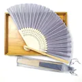 Detail view of lavender silk folding fan with bamboo ribs and organza gift pouch - No. 15 Silver