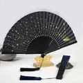 Black folding fan with gold starry sky pattern and elegant tassel - Galaxy Black