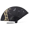 Elegant black Japanese folding fan with bamboo handle and dragonfly pattern designs - Black Fan With Golden Dragonfly Bamboo / Black Surface/Black Tassel