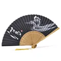 Classic Japanese bamboo folding fan with black ink-wash wave pattern and yellow tassel - Black Fan With Calligraphy Qīng / Black Surface/Yellow Tassel