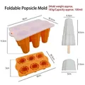 Collapsible 6-cell orange silicone popsicle mold with clear size and weight details - Cloud Style (J-289) / Orange