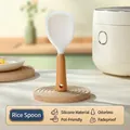 Ergonomic standing silicone rice ladle with food-grade material and wood-textured handle - Hooked Translucent Wood Handle / Off White