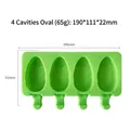Green silicone popsicle mold with 4 oval cavities and detailed size dimensions. - 4-Cavity Oval Style (J-127) / Mold With Lid / Random Color
