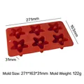 Star-shaped 6-cavity red silicone baking mold shown with precise metric dimensions and weight - Star Donut Style (J-250) / Red