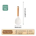 White food-grade silicone rice paddle with a natural wooden handle and non-stick texture - New Kitchenware [Rice Paddle]
