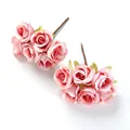 Detailansicht rosa künstlicher Tee-Rosen für DIY-Blumenkränze und Dekorationen - Rosa Knospe (1 Bund 7 Blüten) / 7 Köpfe Pro Strauß
