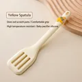 Cream yellow silicone slotted spatula with cute cartoon character handle decoration - Creamy Yellow Cartoon Turner