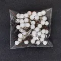 Detailed view of white glitter Christmas berries in clear plastic packaging. - Fruit Diameter ~10mm (Stem 5.5cm) / White (Coffee Stem)