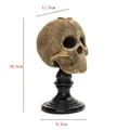 Gothic gouden getextureerde schedel kaarsenhouder op zwarte voet met afmetingen - Gouden Schedel (384)