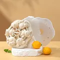 Cute beige silicone mold for baby food steaming featuring bear and cat paw shapes - Off-White