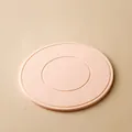 Round peach silicone heat-resistant mat with concentric grooves for table protection - Pink